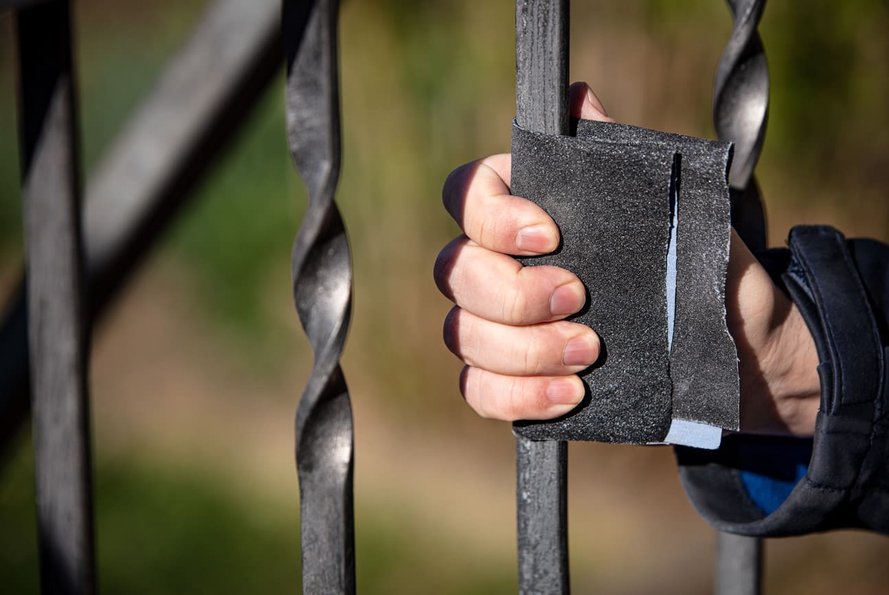 sanding metal railing