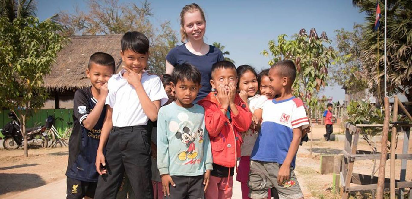 Teacher and her kids in Cambodia