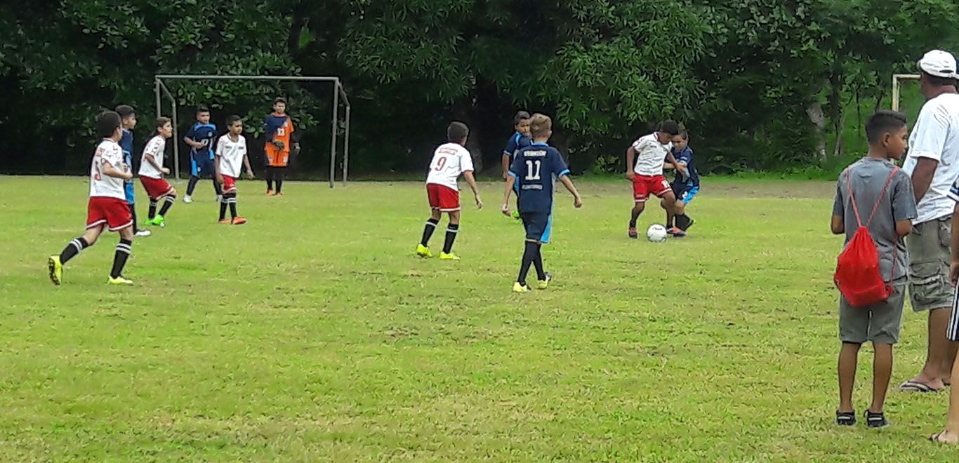 Kids playing football in Costa Rica