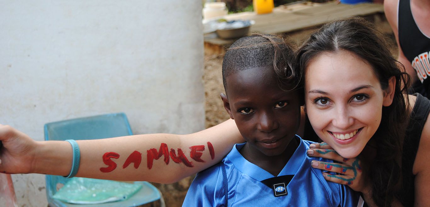 Art teacher with her student in Ghana