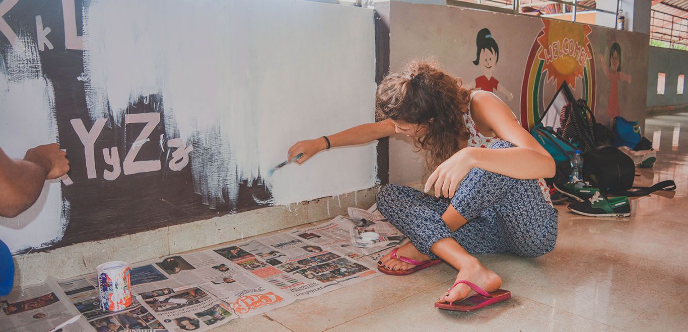 Women painting a wall