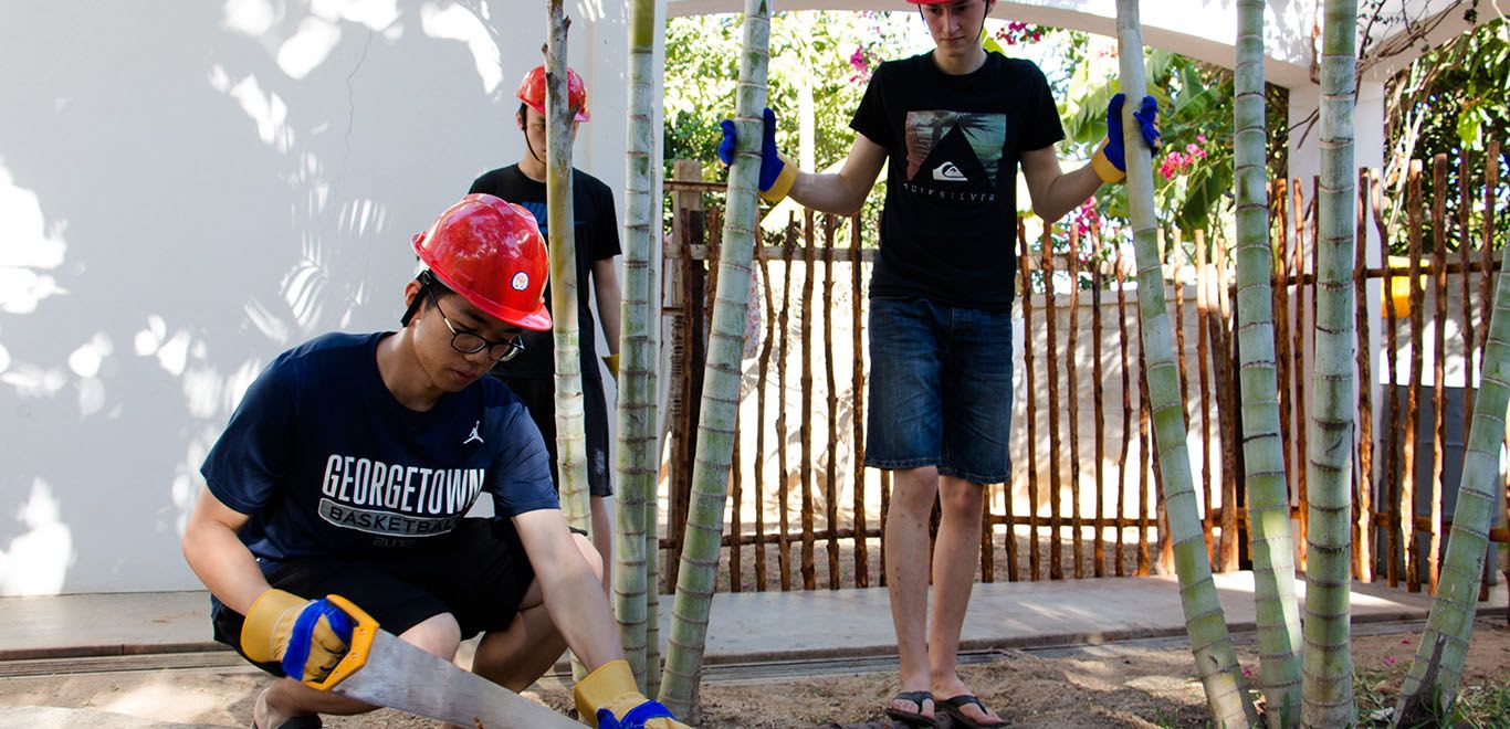 Sawing wood in construction project in Kenya