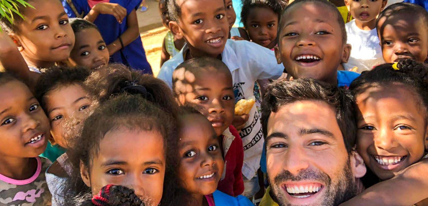 Volunteer teacher and his class