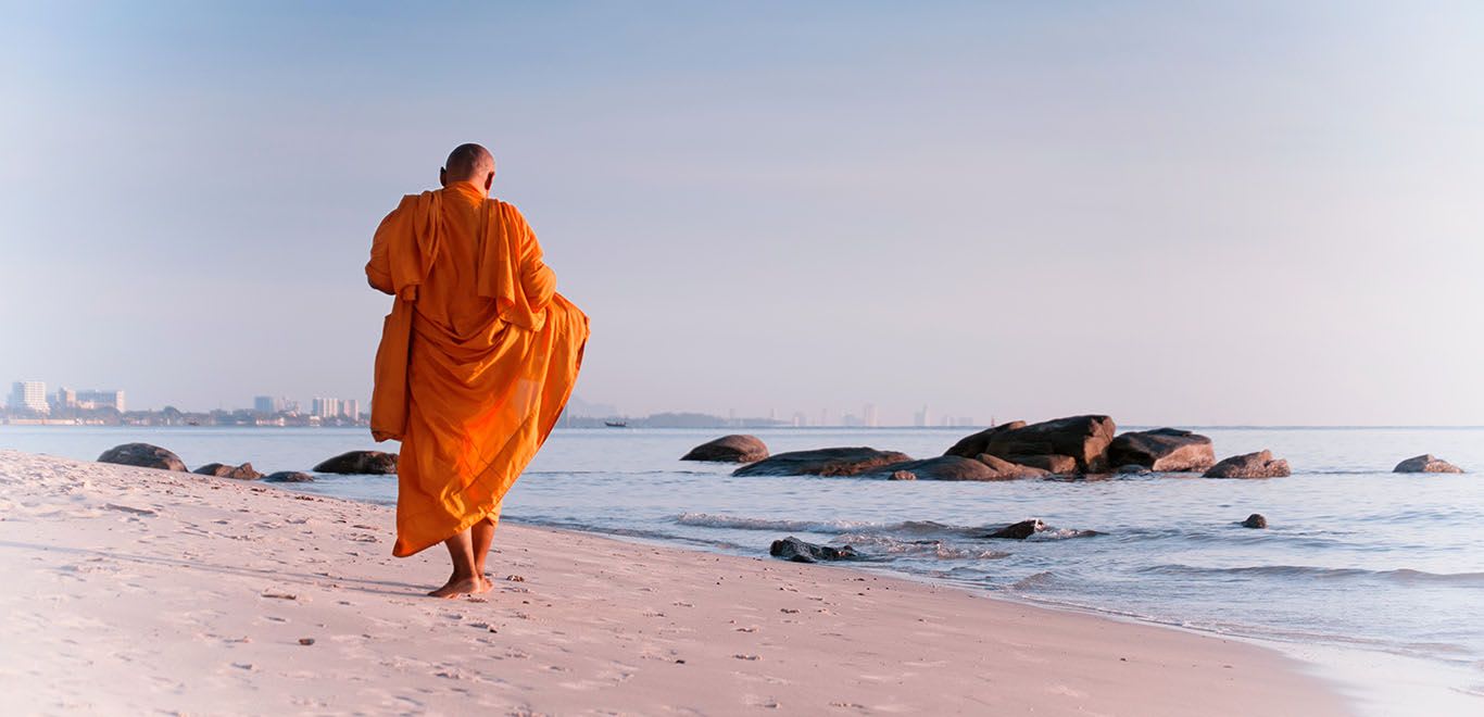 Monk on a beach in Hua Hin, Thailand