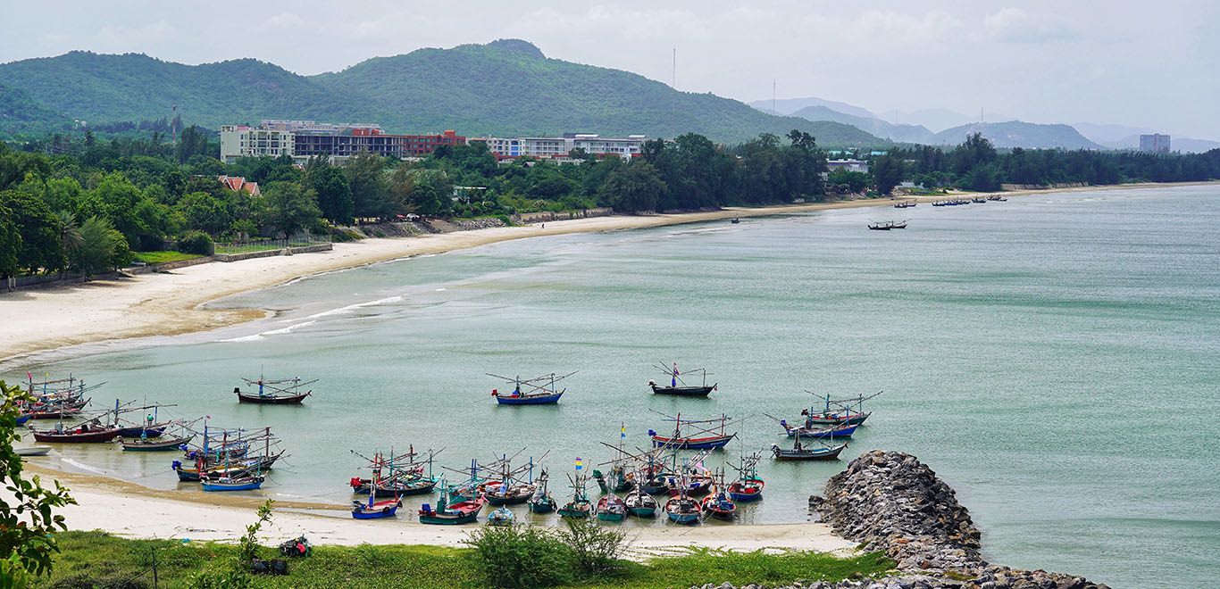 View of Khao Tao beach and fishing boats.