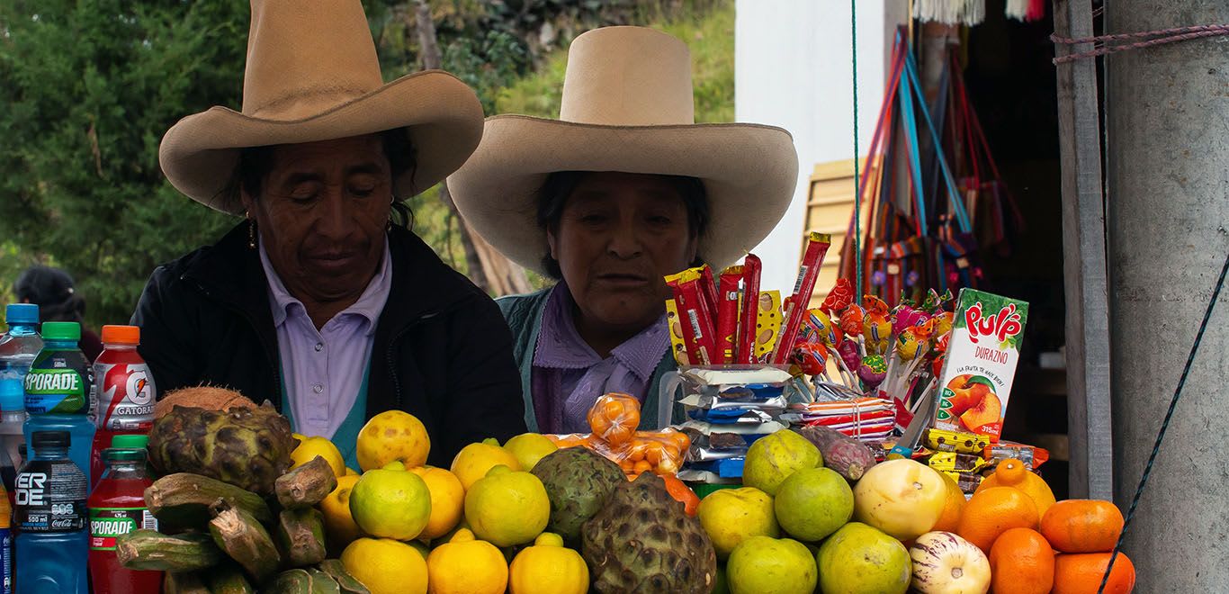 Local peoples selling food in Cajamarca, Peru