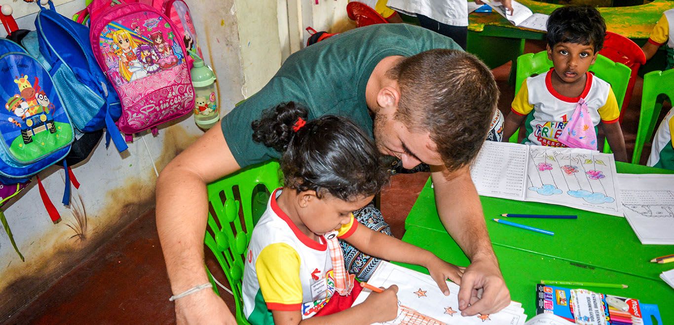 Teacher with kids in Sri Lanka