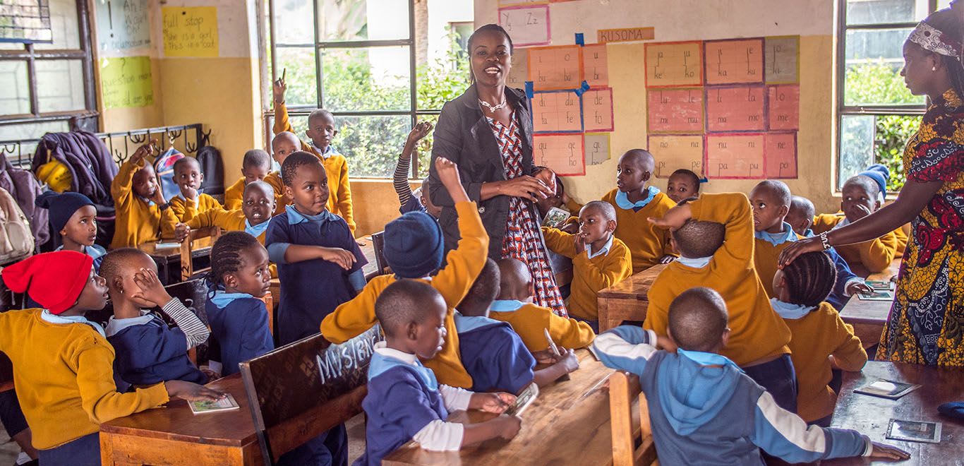 Teachers and kids in classroom in Tanzania