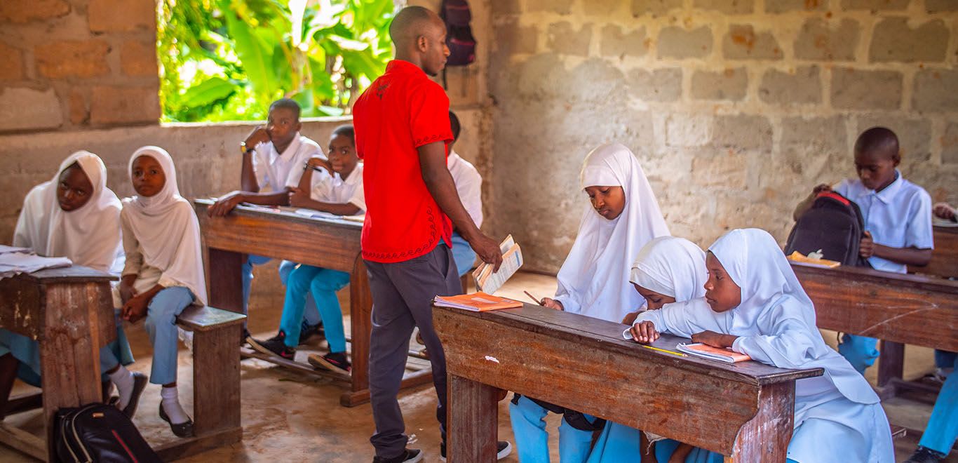 Teacher and students in Zanzibar