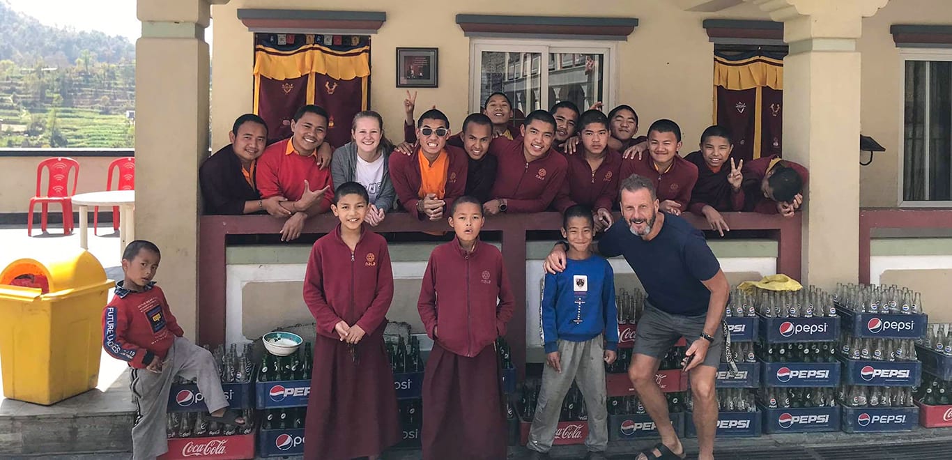 Volunteers teaching kids in Nepal