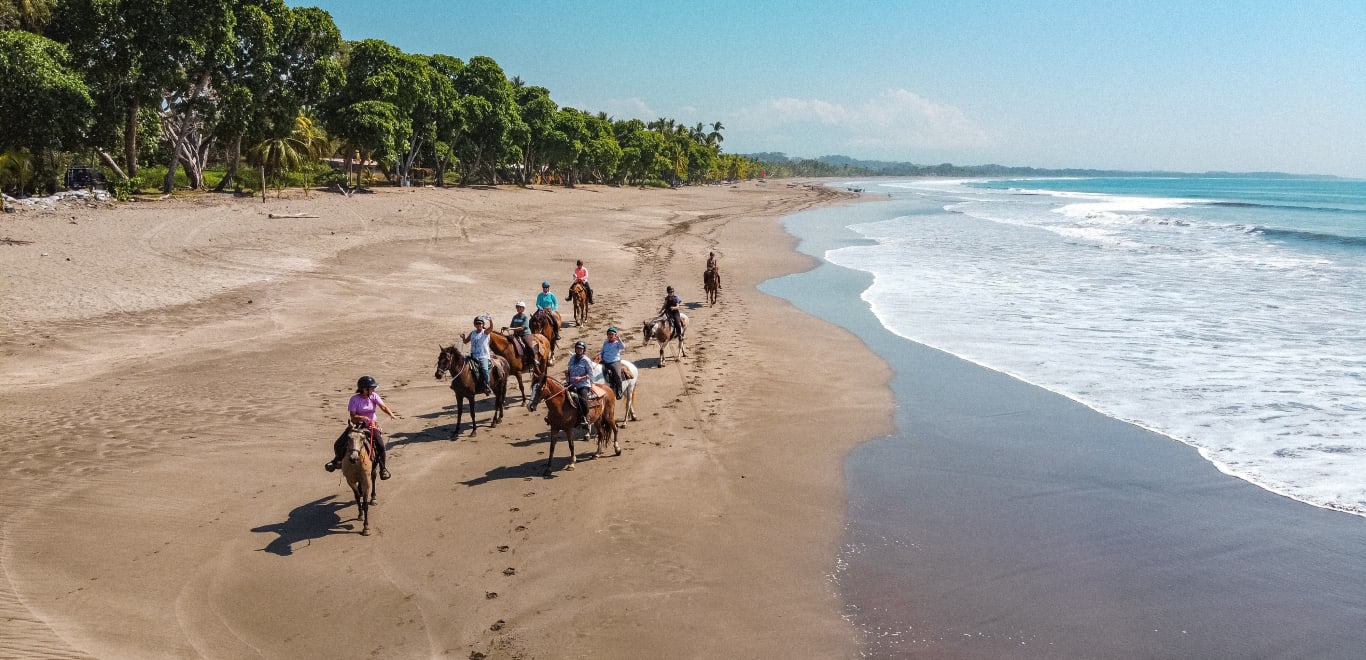 Horse riding on the beach in Costa Rica