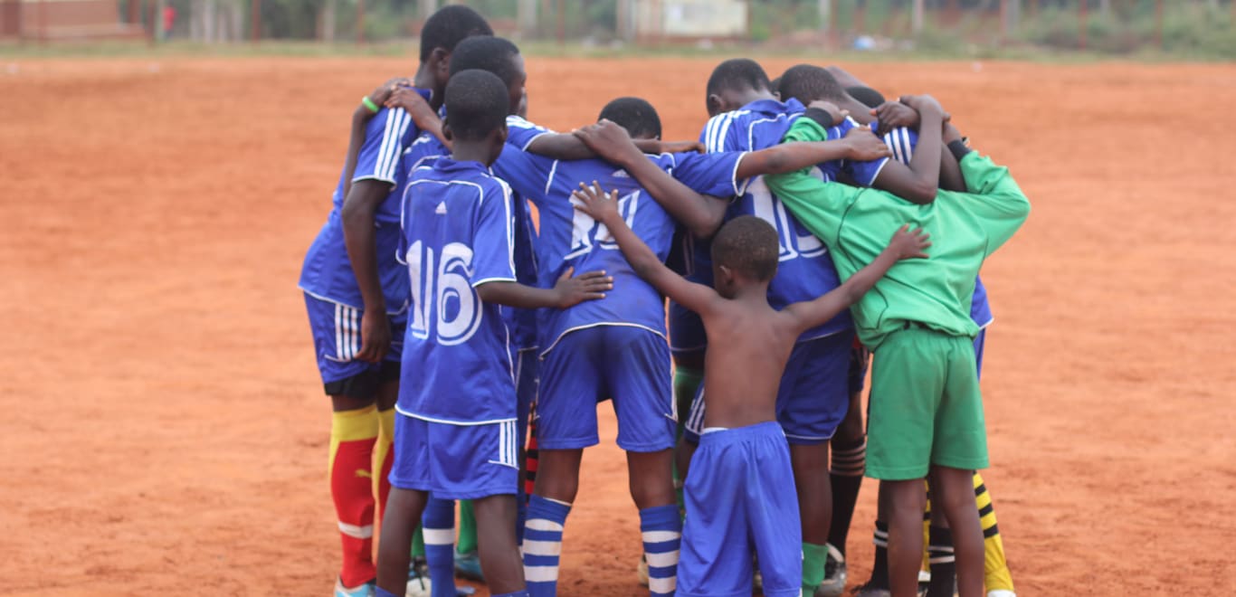 Kids playing football in Ghana