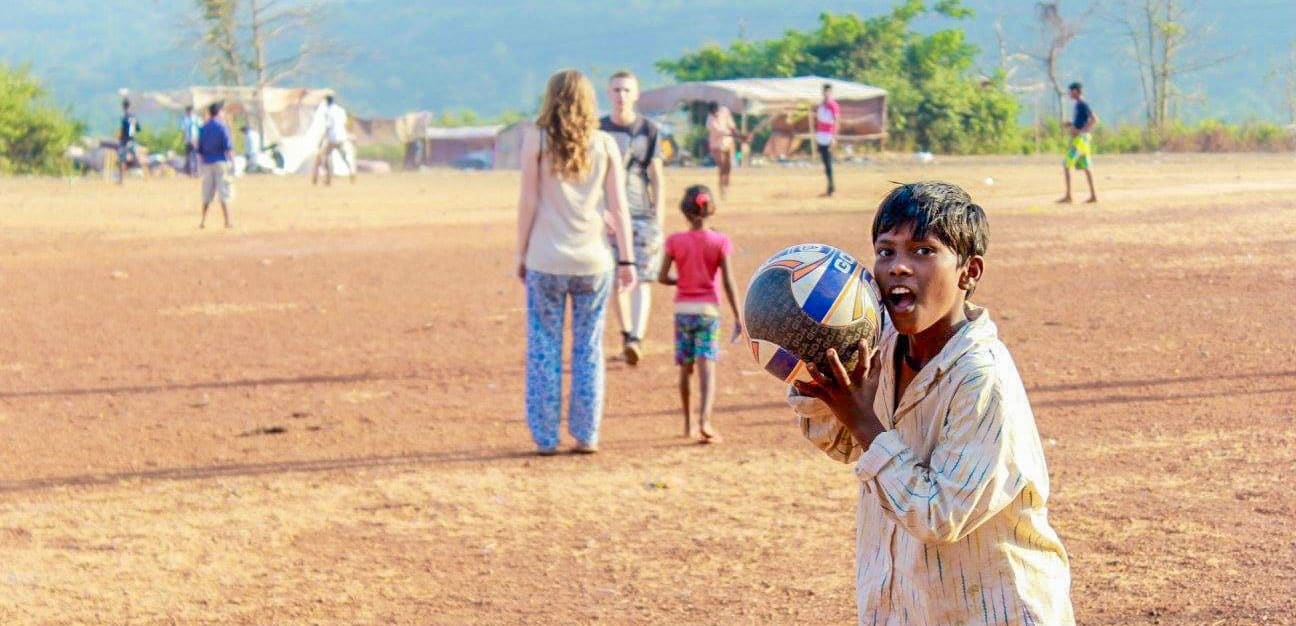 Kid with a football in Goa, India