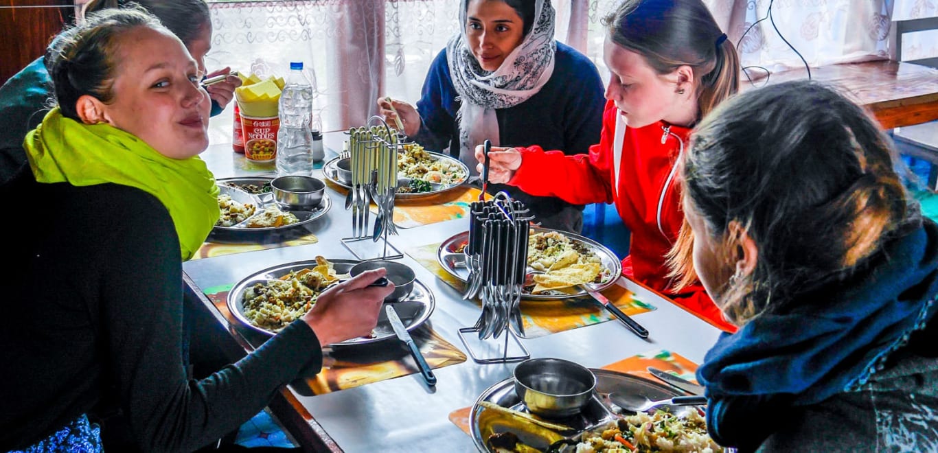 Enjoying local food on the Poon Hill Trek in Nepal