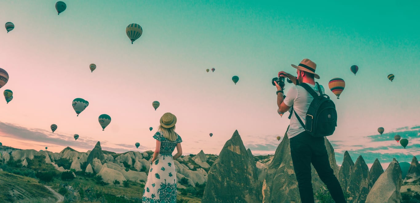 Man taking photo of girlfriend