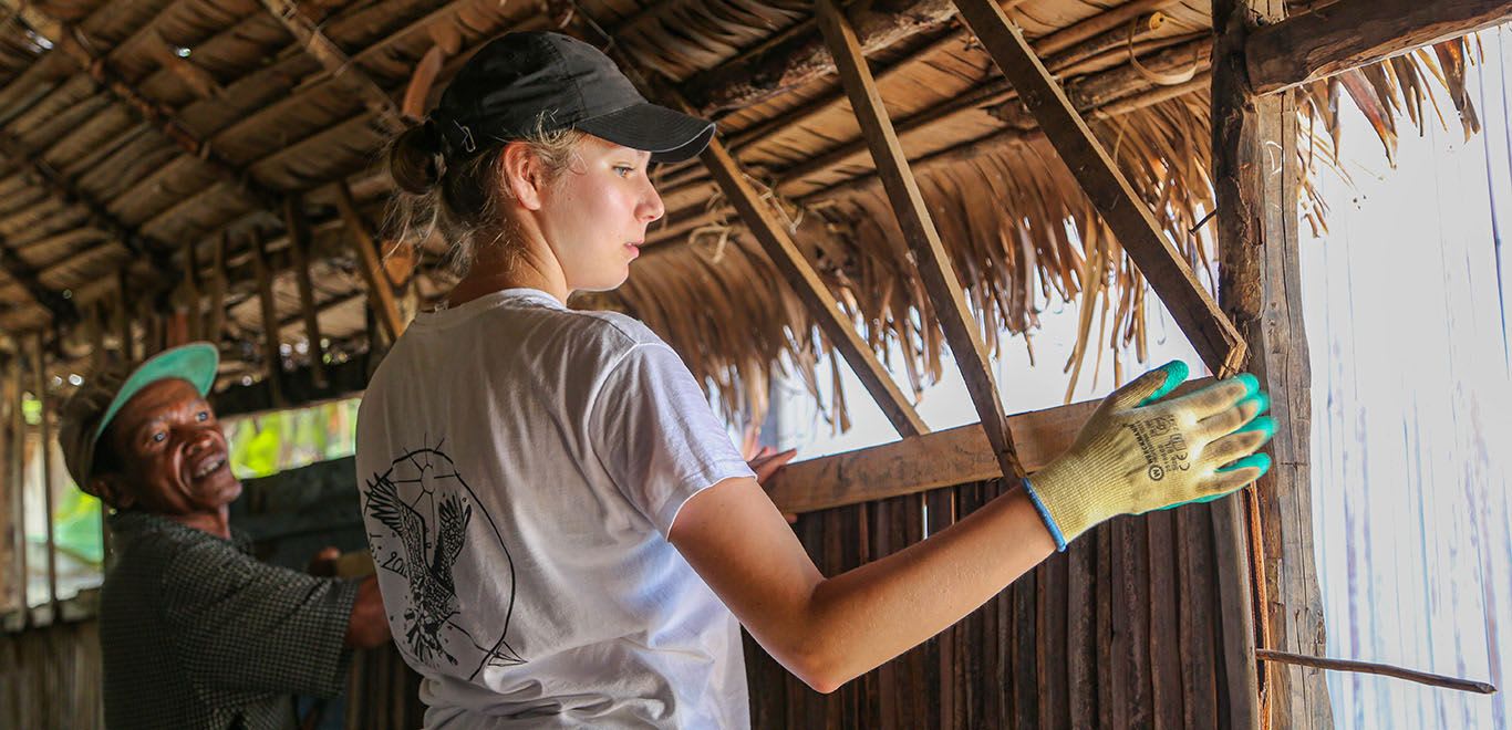 Volunteer renovating house in Madagascar