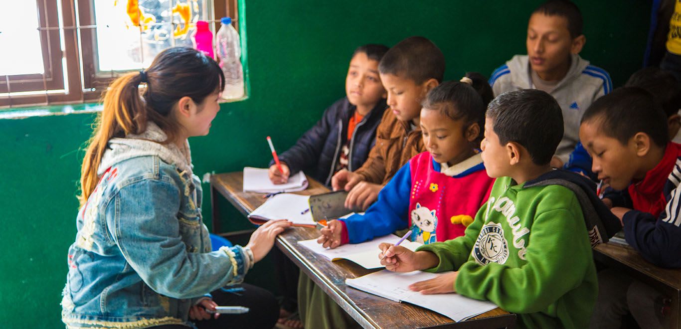 Teacher with her class in Nepal