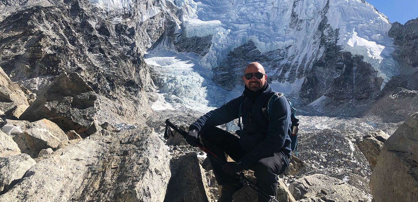 Man at a rest stop on the Everest Base Camp Hike