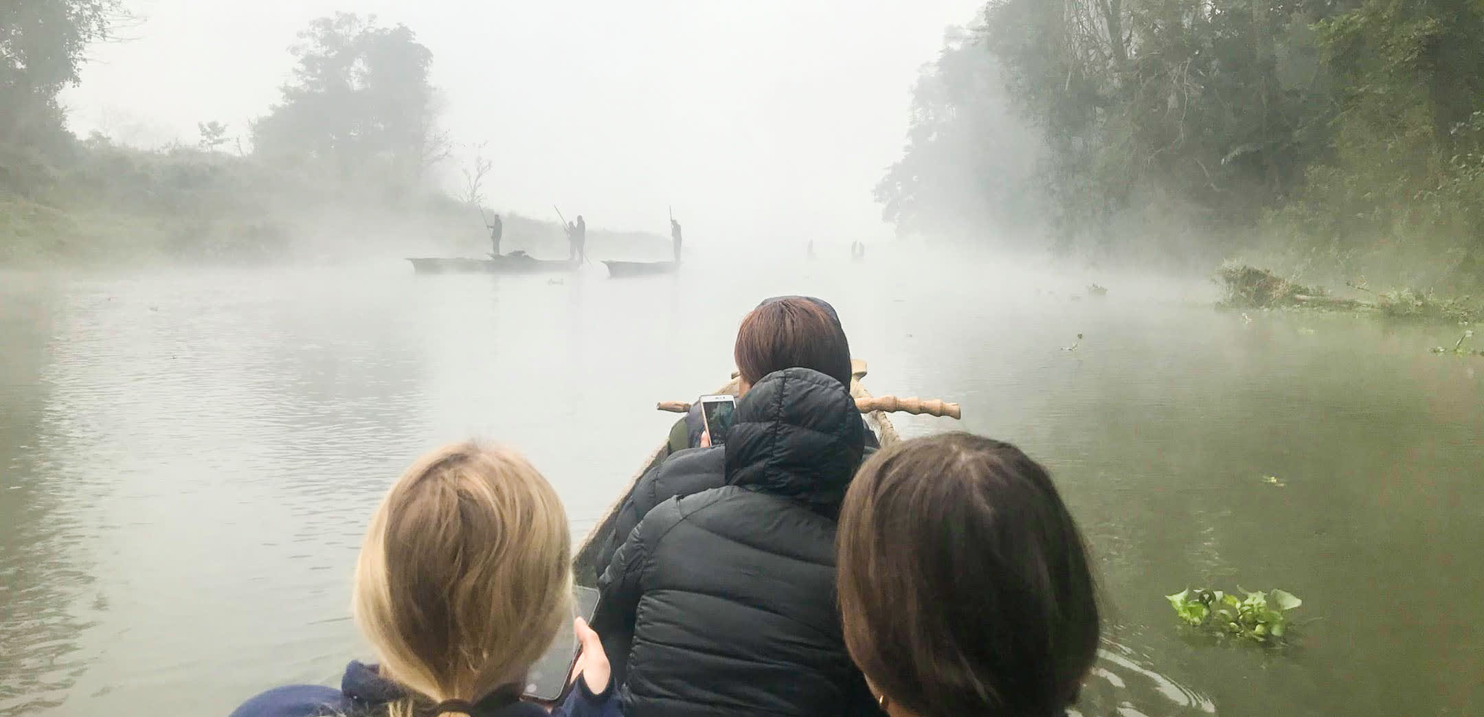 Misty boat ride in Nepal