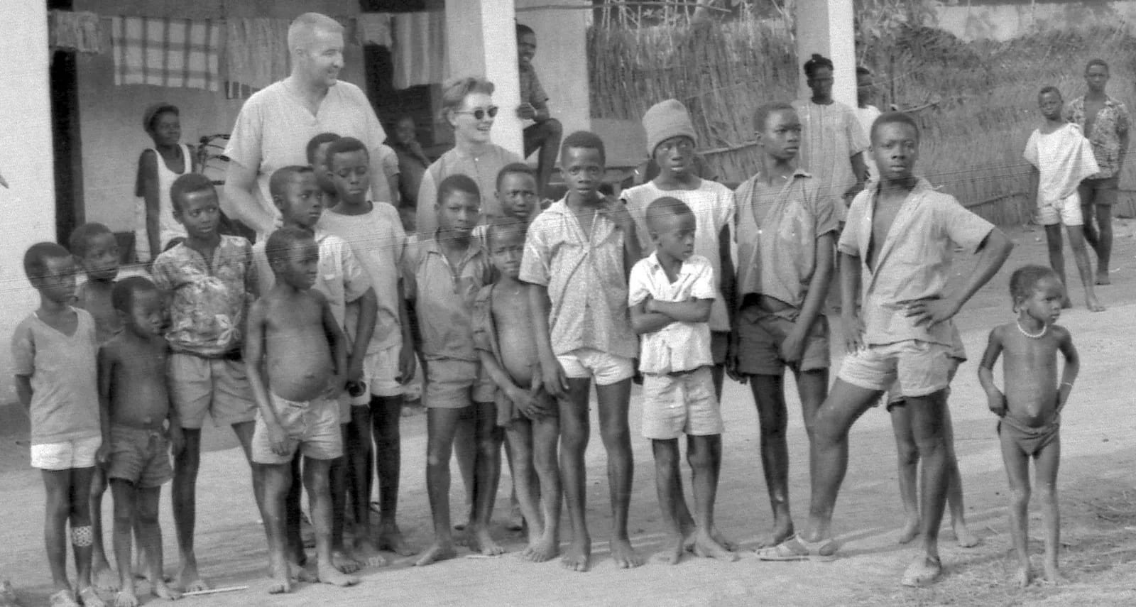 American missionary couple with residents of Bafodia, Sierra Leone (West Africa) (2098796682)