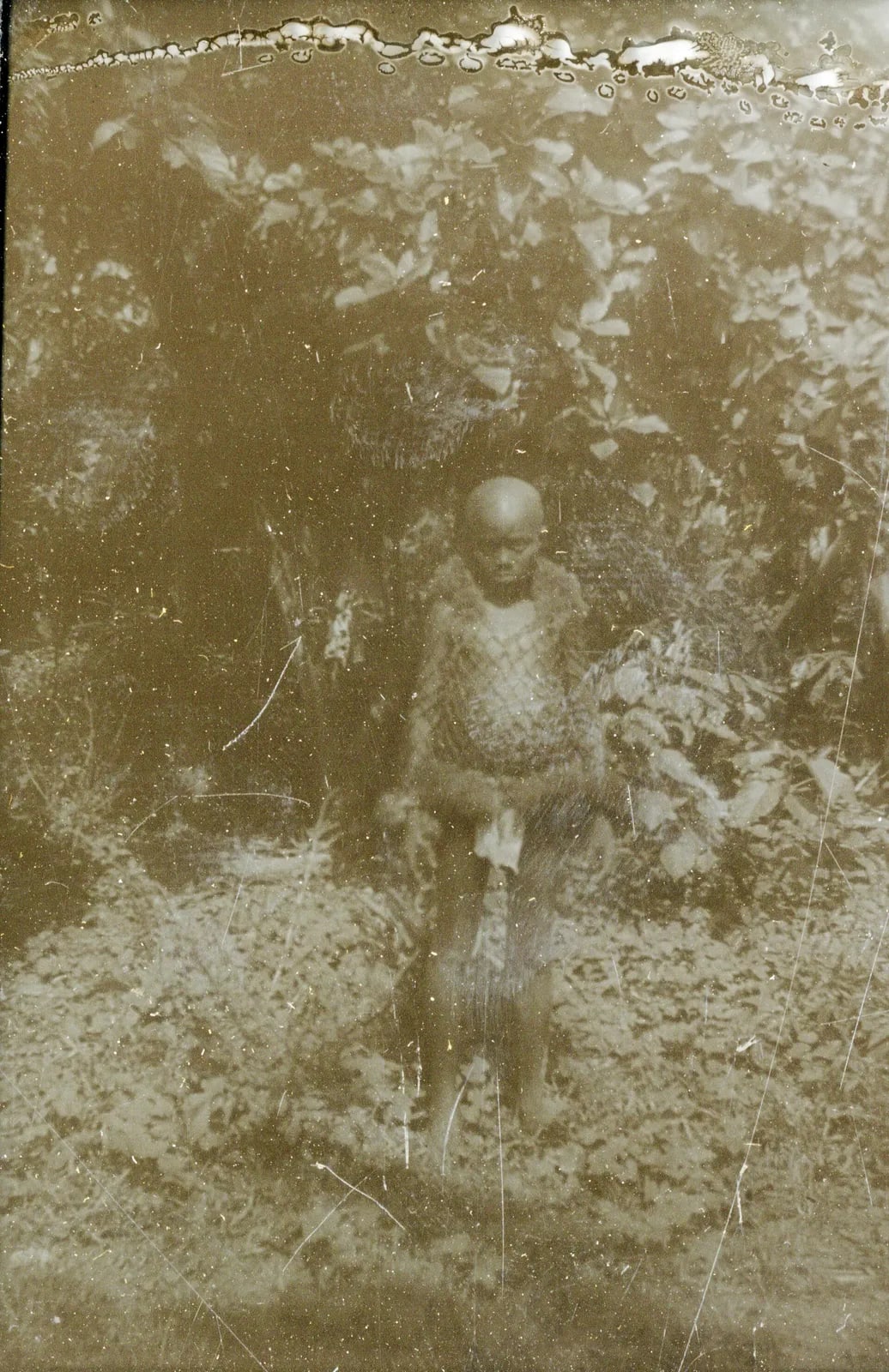 Boy posing with Poro Clothing, Panguma