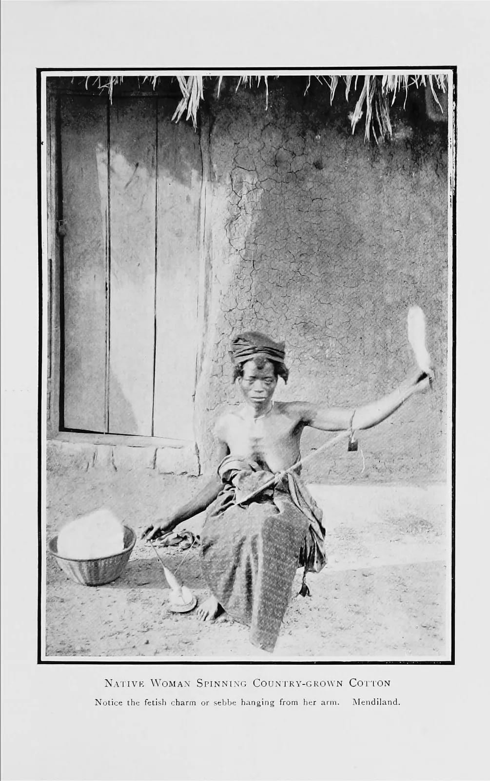 Mende woman spinning country-grown cotton, 1910