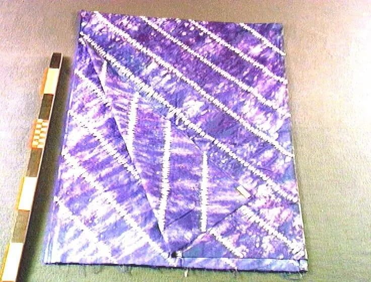 Blue and purple gara lappa with diagonal white lines (second cloth)