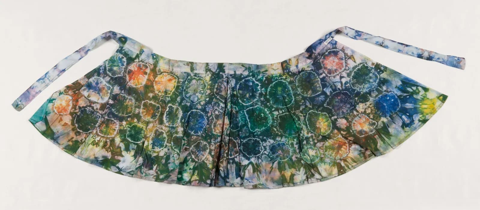 Girl's gara wrap skirt with tied circles
