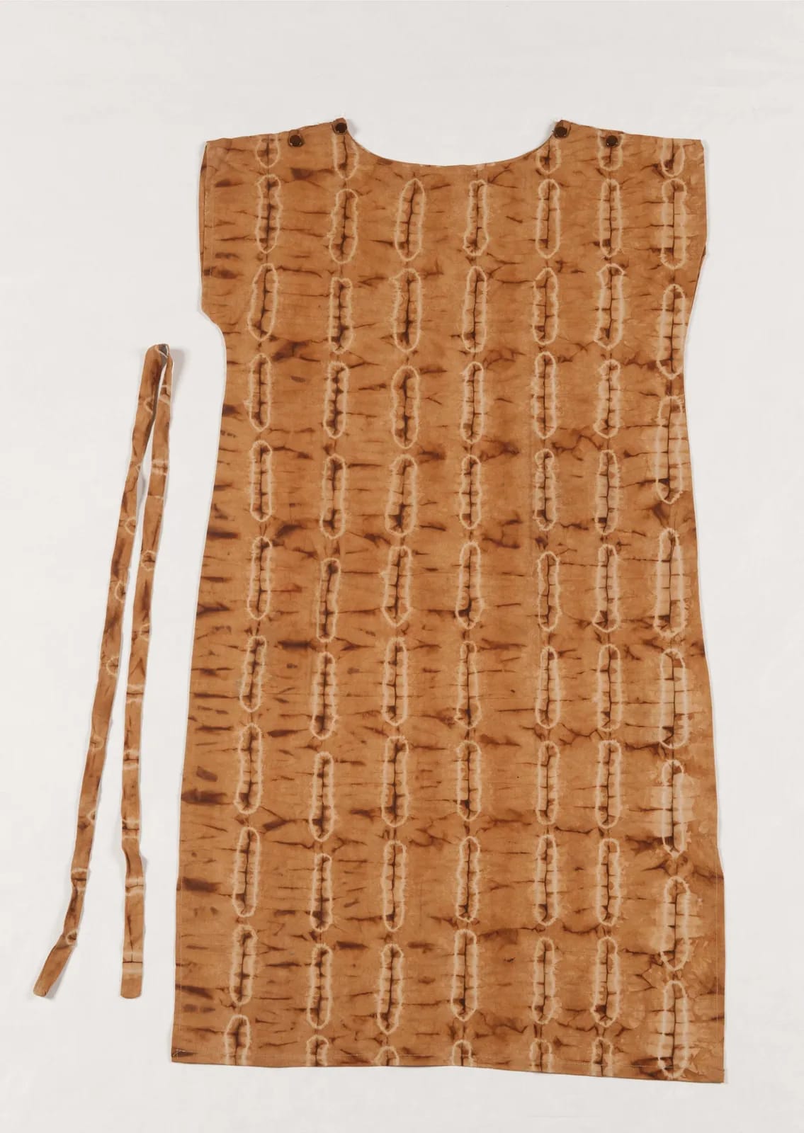 Brown gara dress with tied oblong pattern and belt