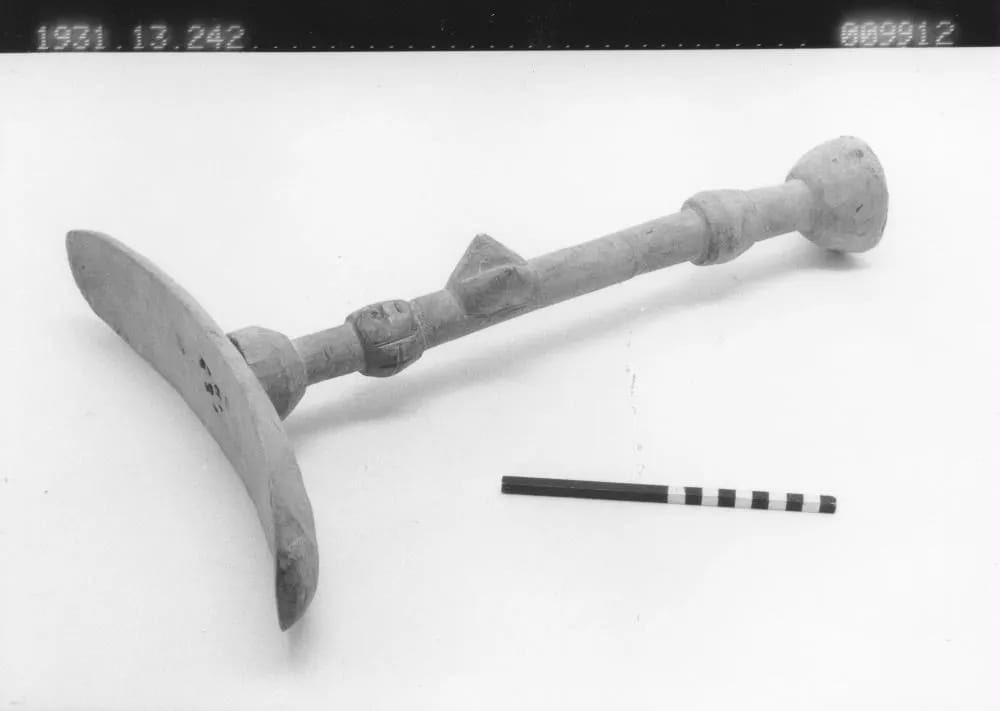 Kissi stool with a foot carved as a woman