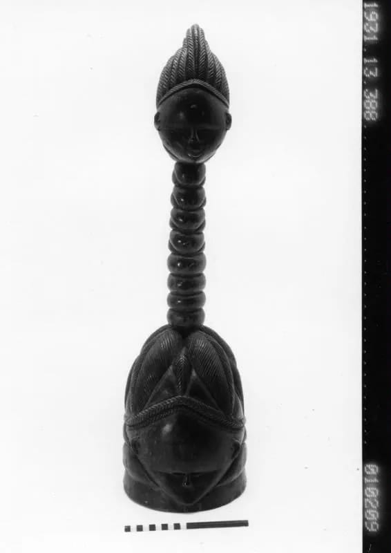 Bundu (Sande) helmet mask crowned with a long-necked head, Vai