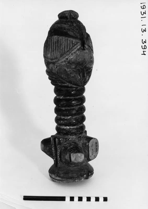 Old figure of a long-necked woman