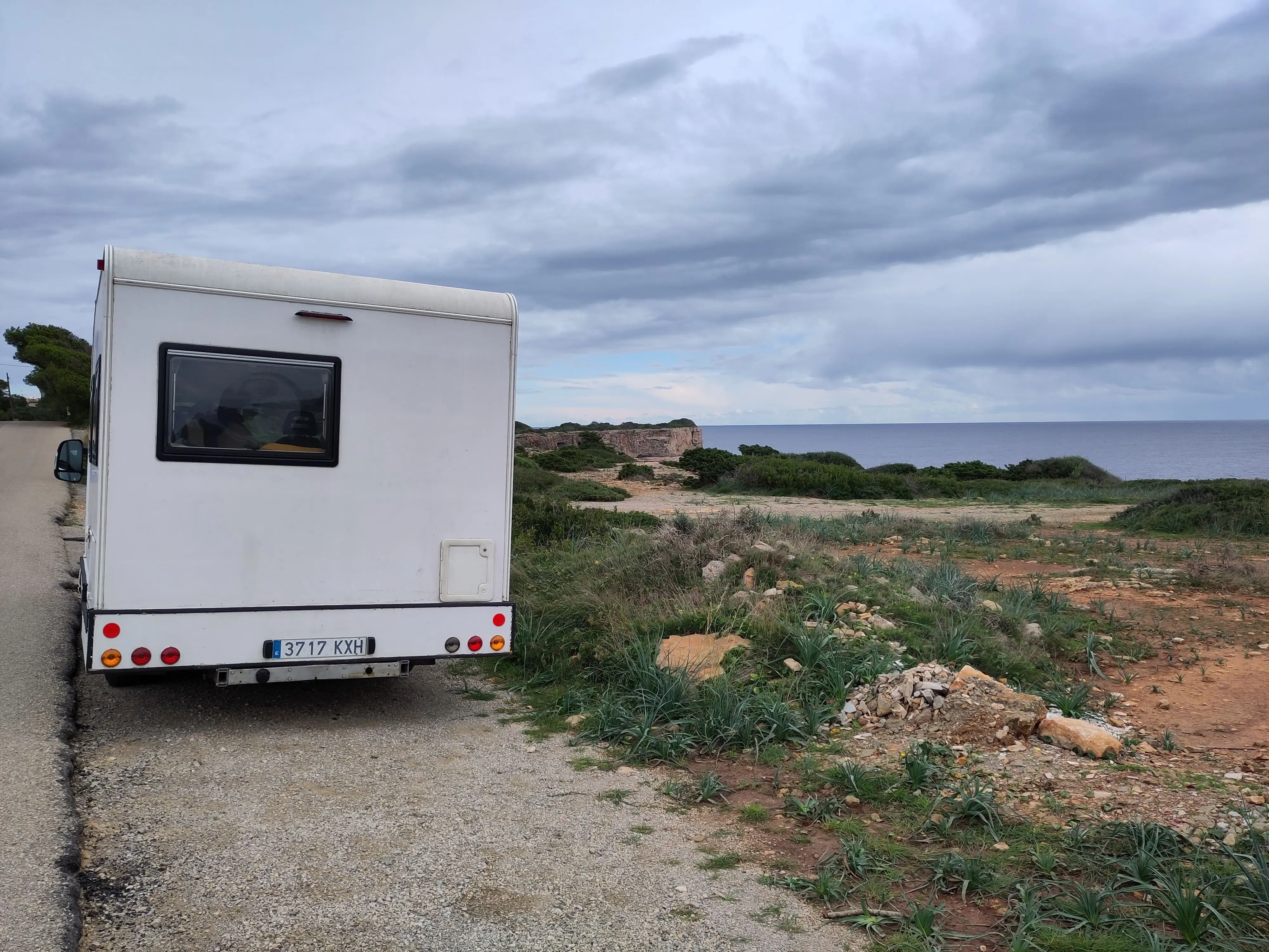 Parked at the roadside overlooking the cliffs