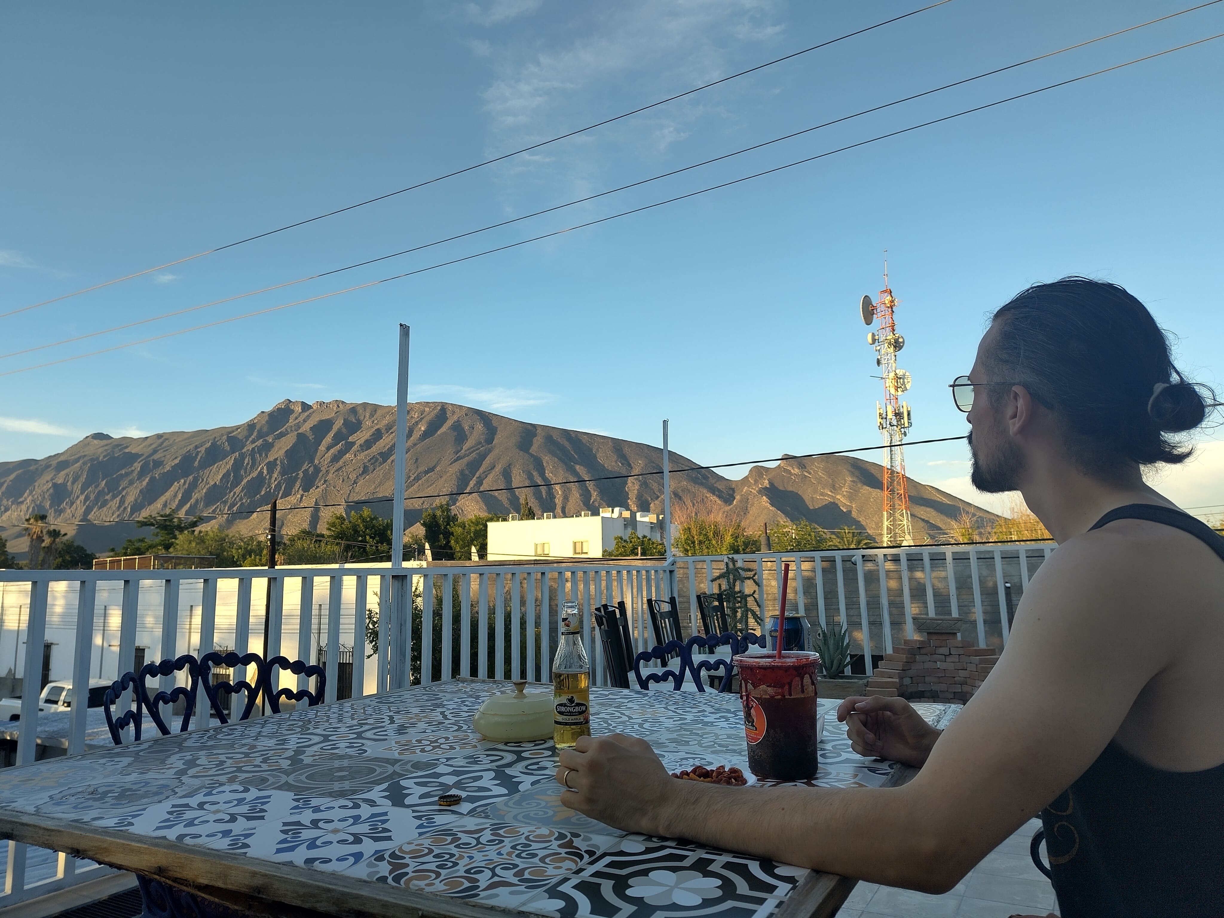 Alex enjoying a michelada on the terrace