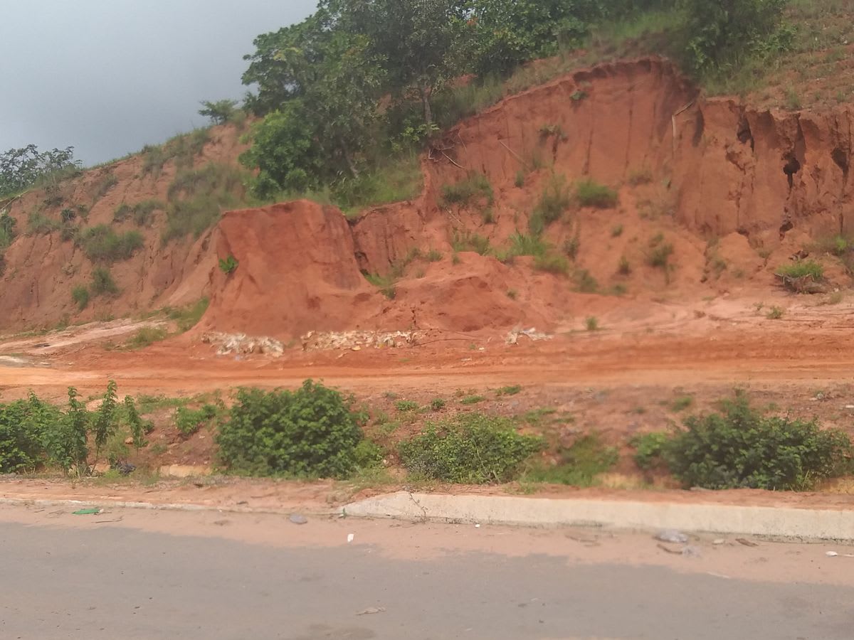 Gully erosion cutting into a roadside at 9th Mile Corner, Enugu State