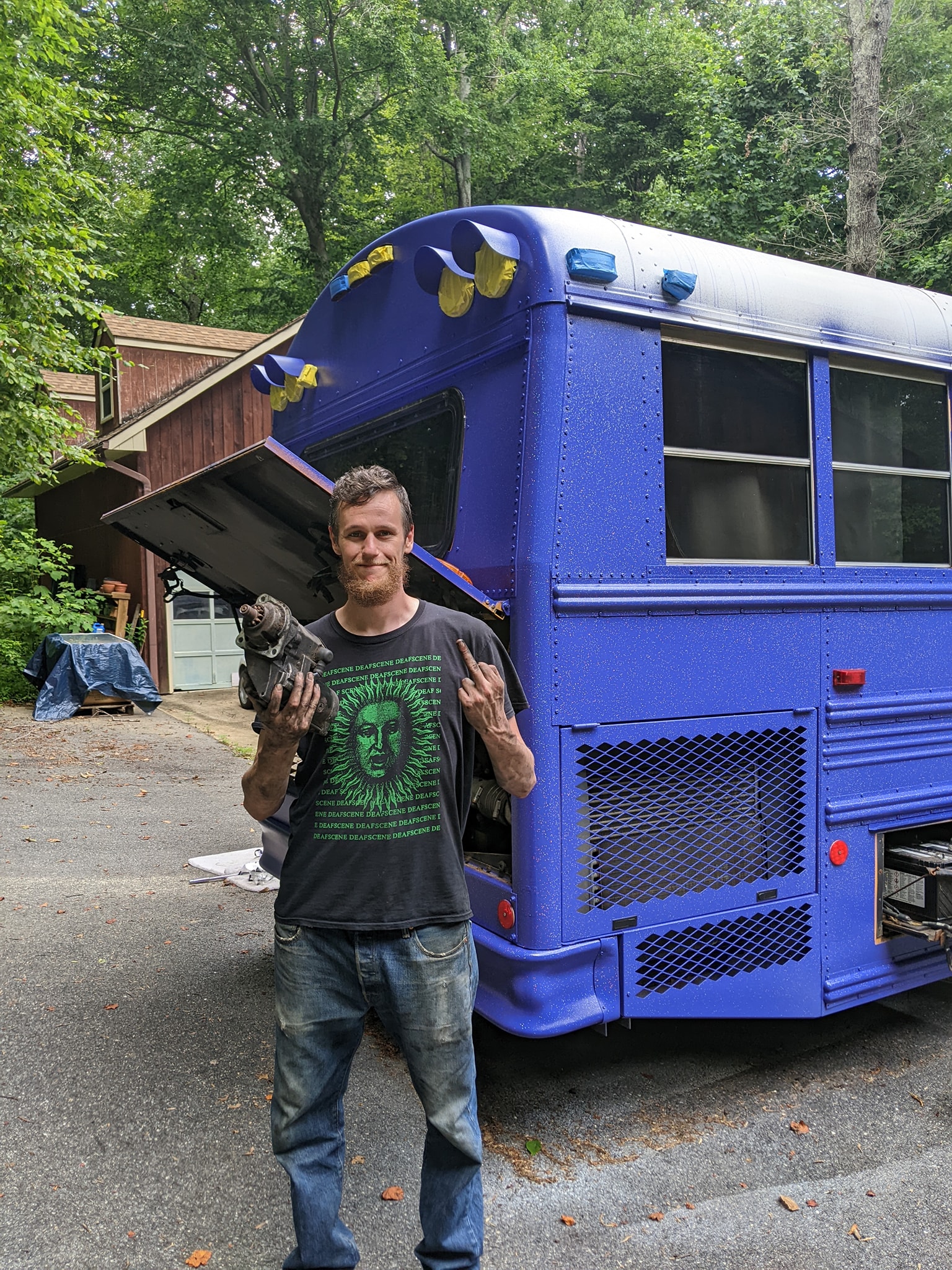 James Jernigan Holding Broken Bus Starter