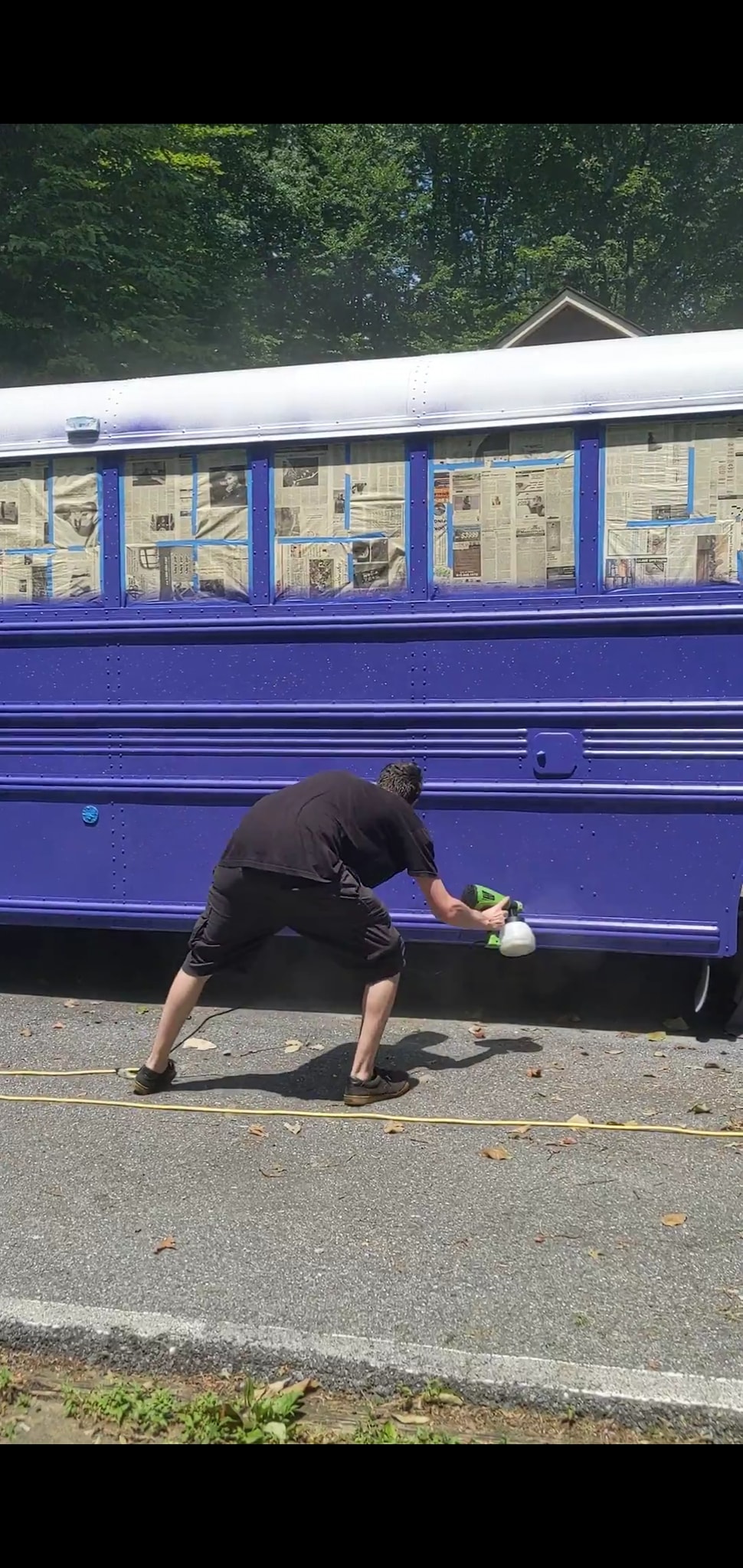 Spraying Bus with Holographic Flake and Clearcoat