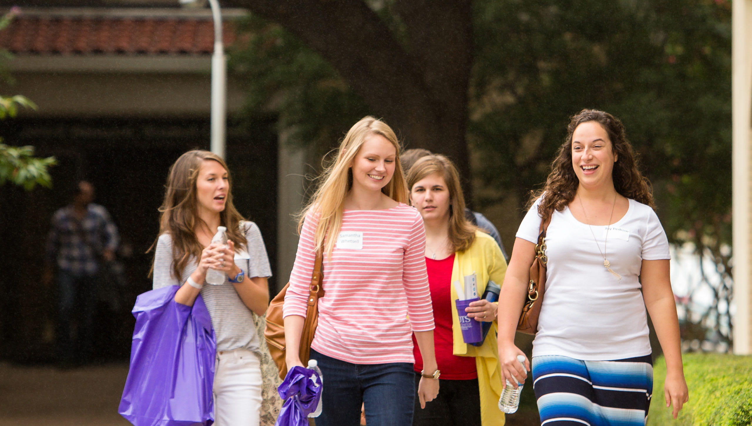 three Christian Education students walking outside