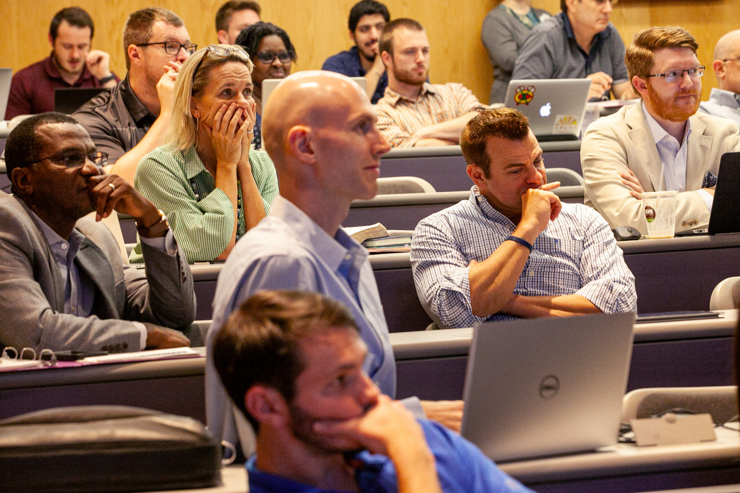 Seminary students in a classroom listening to a professor