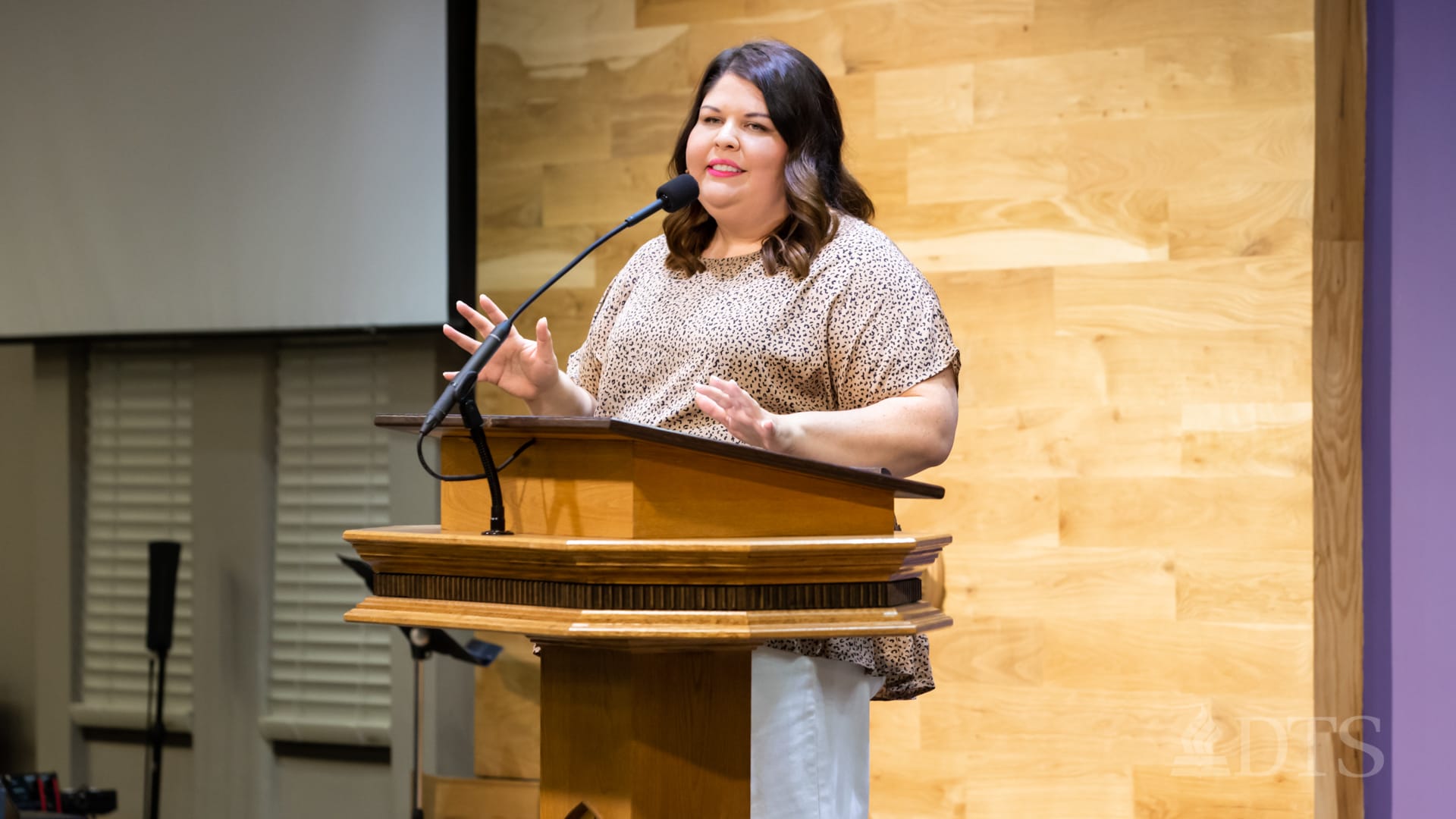 A photo of Liz Rodriguez in Lamb Auditorium at DTS