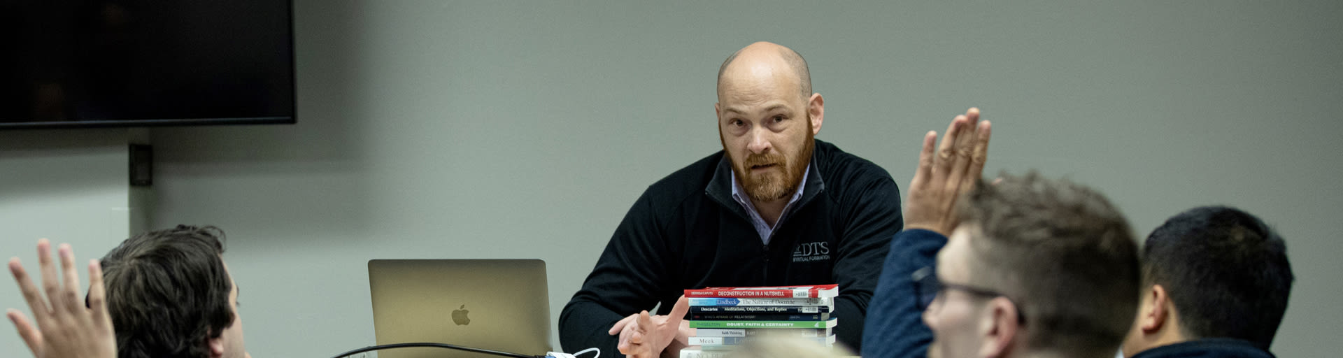 Armitage teaching a class