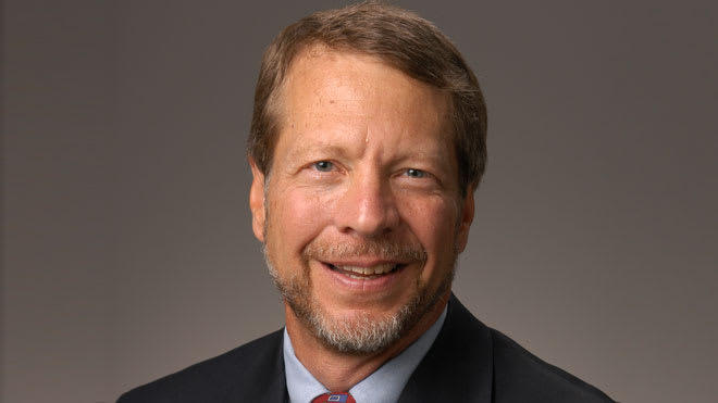 DTS alum Steve Strauss smile while looking at the camera