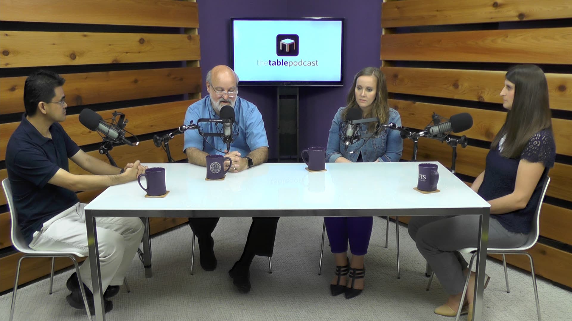 Dr. Bock and guests recording The Table podcast