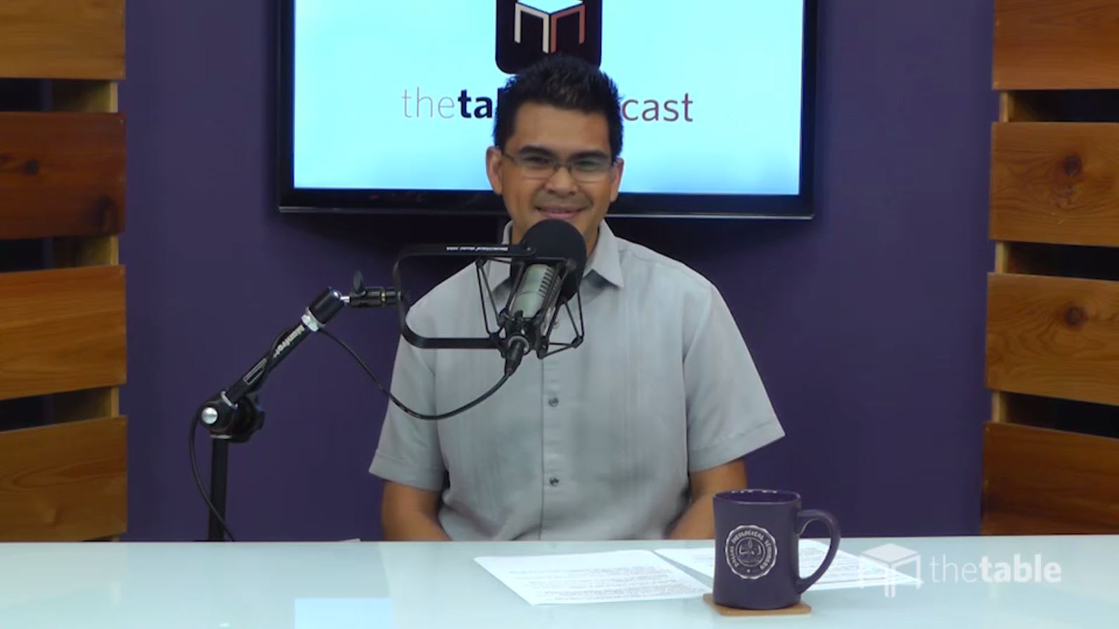 Mikel Del Rosario recording The Table podcast