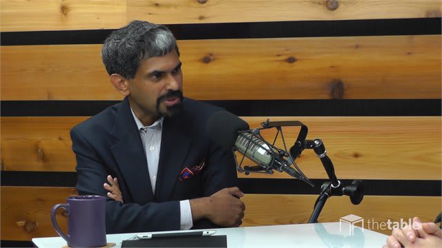 Abraham Kuruvilla recording The Table podcast