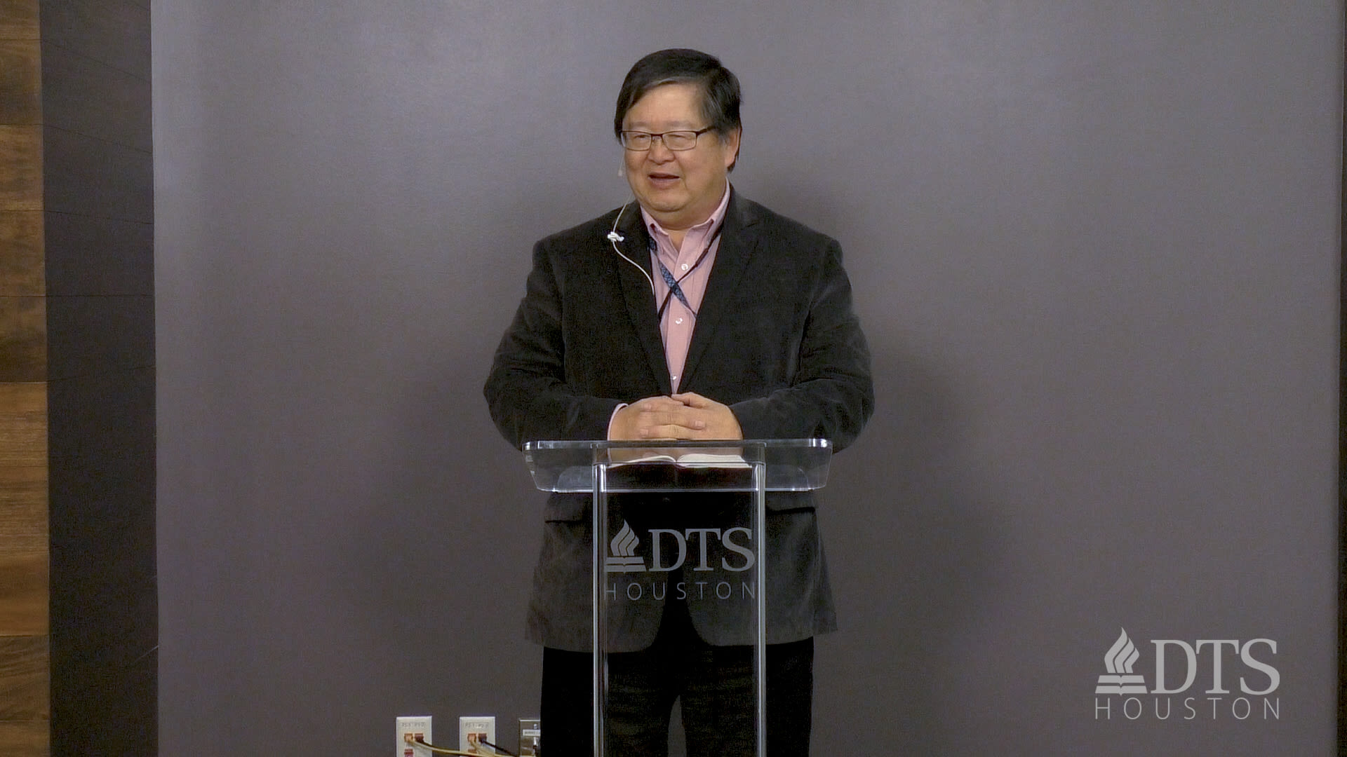 man standing at podium speaking at DTS Chapel