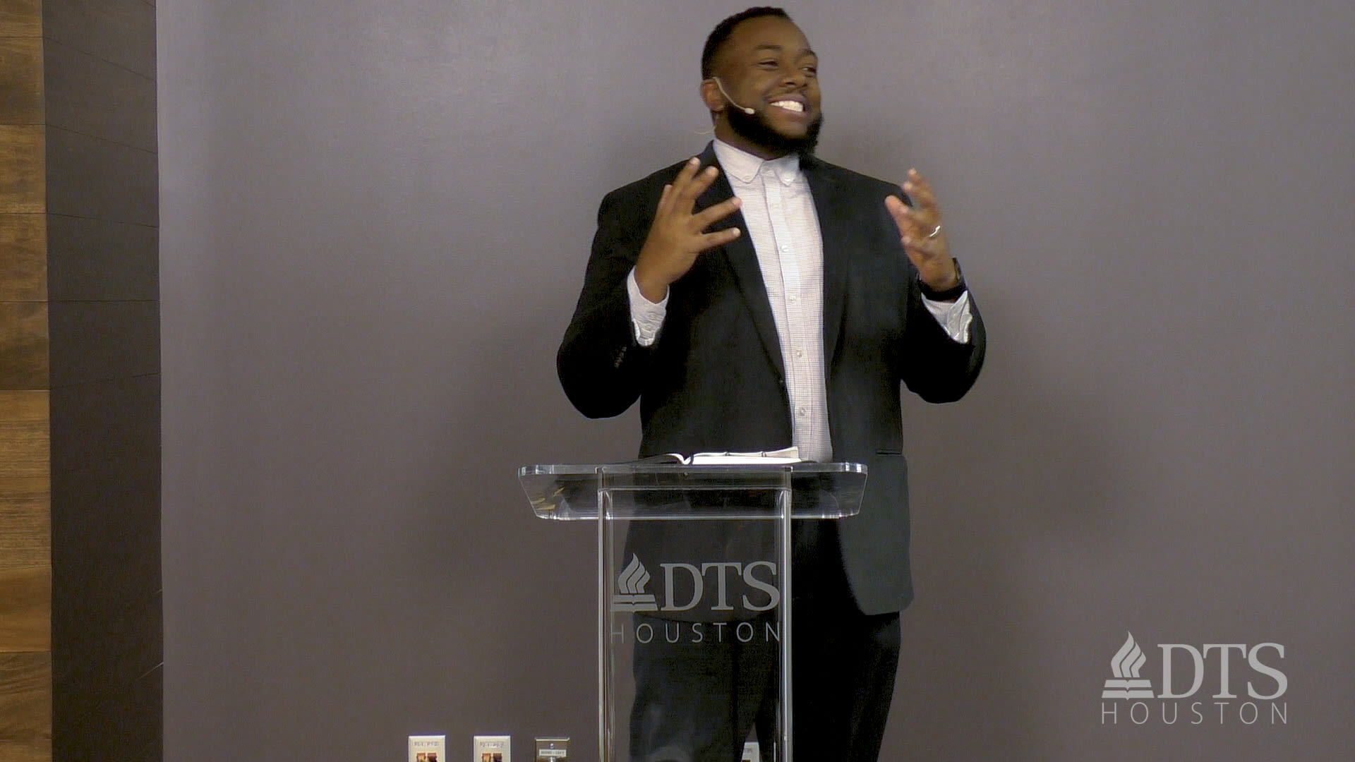 man standing at podium speaking at DTS Chapel