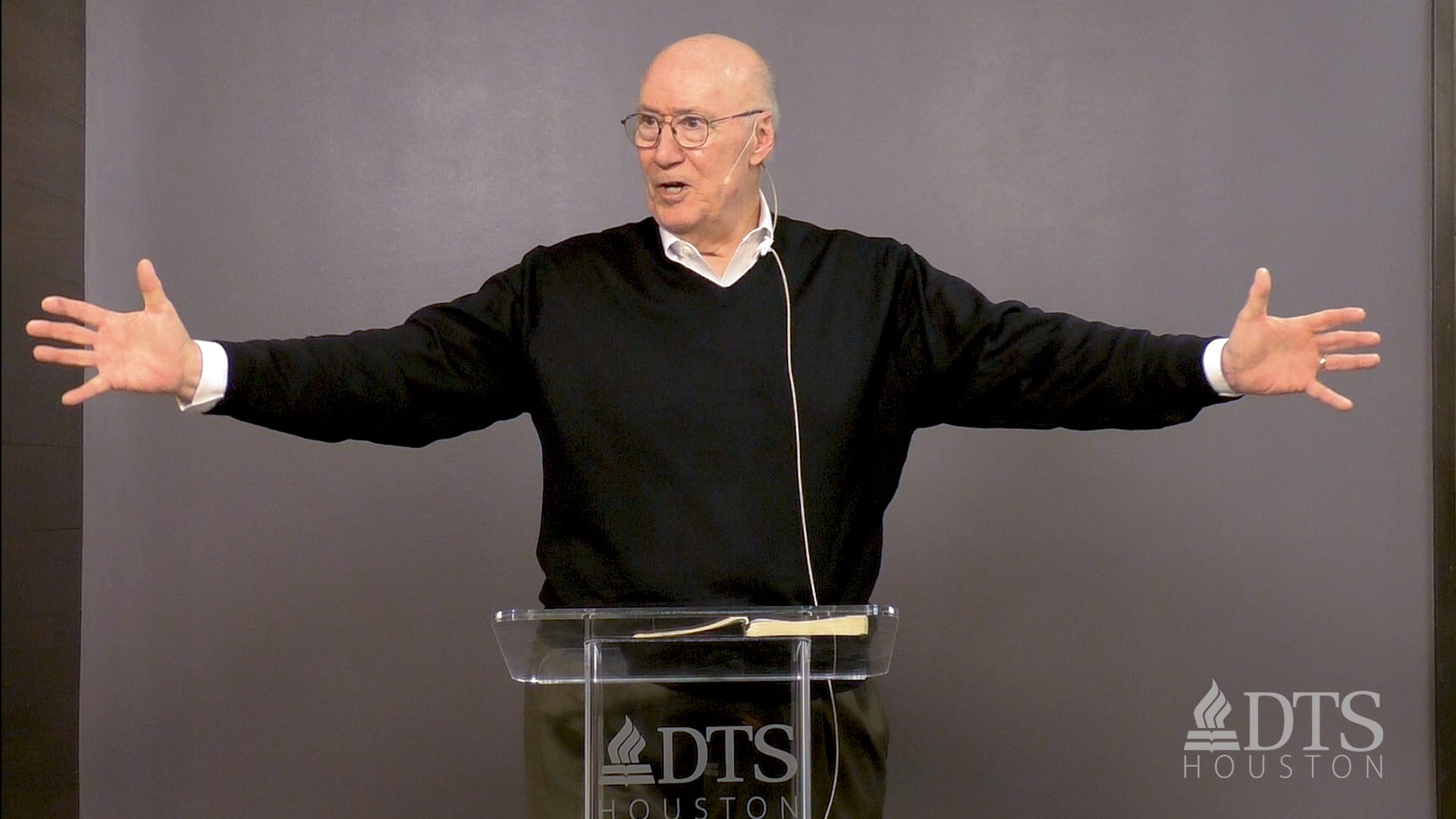 man standing at podium speaking at DTS Chapel