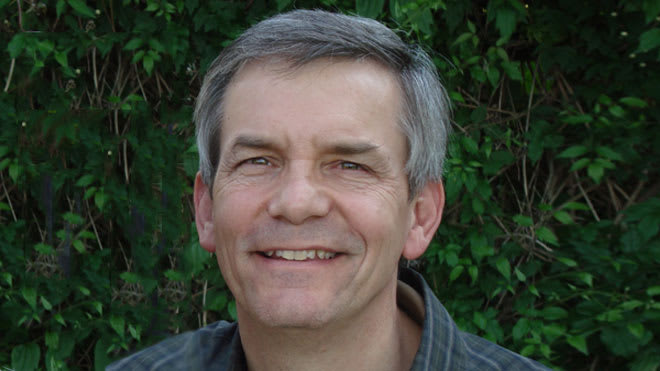 Rick Griffith smiling while looking at the camera