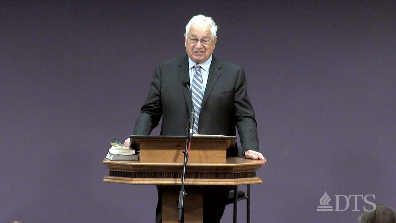 Dr. Walt Kaiser standing at podium speaking at DTS Chapel